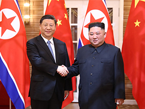 习近平同朝鲜劳动党委员长、国务委员会委员长金正恩举行会谈