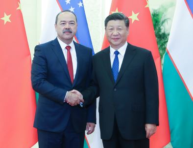 习近平会见乌兹别克斯坦总理阿里波夫 
