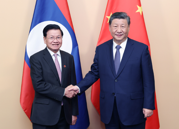 国家主席习近平会见老挝人民革命党中央总书记、国家主席通伦