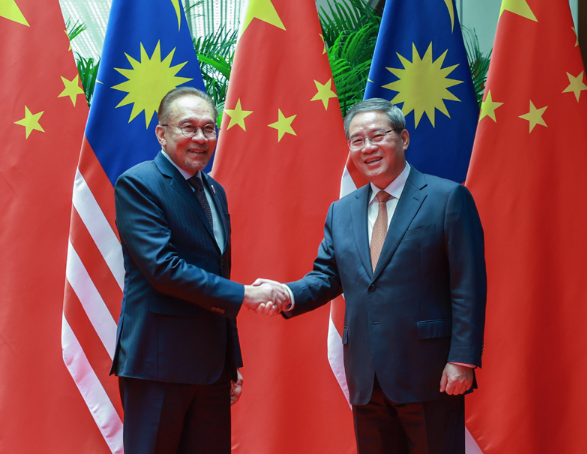 李强会见马来西亚总理安瓦尔